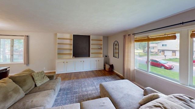1715 Gateway Dr, Albert Lea, MN 56007 - living area featuring dark wood-style flooring and baseboards