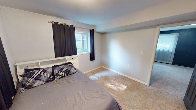 1715 Gateway Dr, Albert Lea, MN 56007 - bedroom with baseboards and light colored carpet