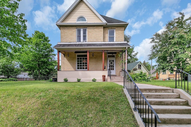 605 7th Ave N, Saint Cloud, MN 56303 - view of front facade featuring brick siding and a porch