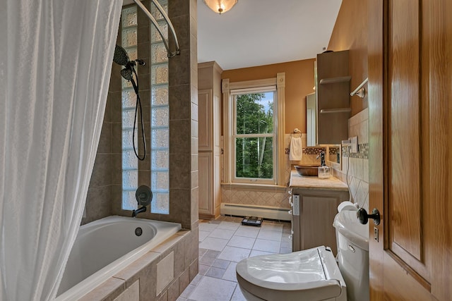 605 7th Ave N, Saint Cloud, MN 56303 - full bathroom with baseboard heating, tiled shower / bath, toilet, vanity, and tile patterned floors