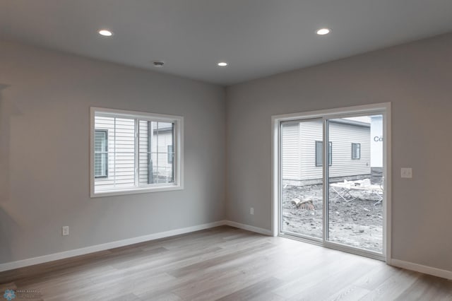 4174 Arthur Dr S, Fargo, ND 58104 - unfurnished room featuring light wood-style floors, baseboards, and recessed lighting