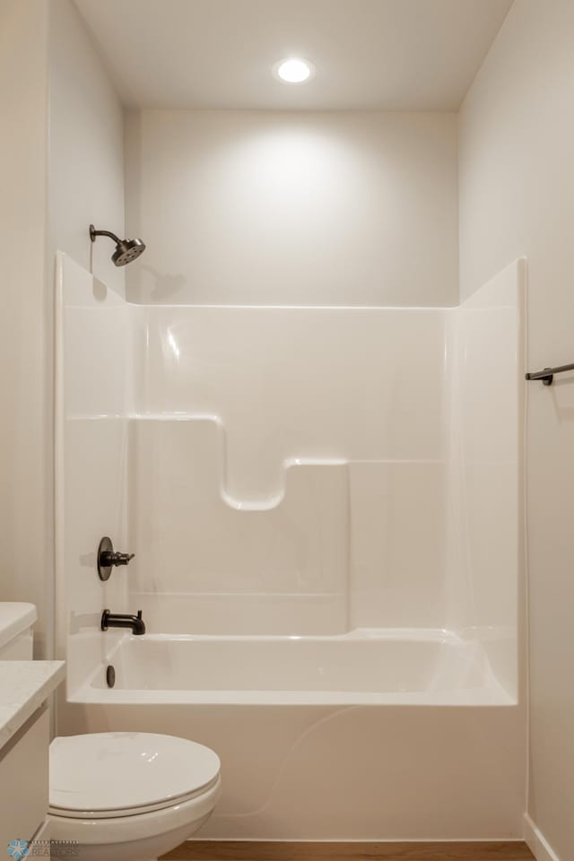 4174 Arthur Dr S, Fargo, ND 58104 - bathroom with toilet, washtub / shower combination, vanity, and recessed lighting