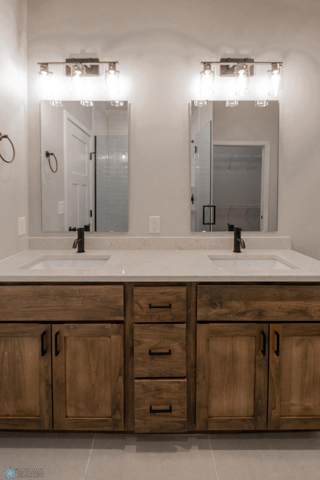4174 Arthur Dr S, Fargo, ND 58104 - full bath with double vanity and tile patterned floors