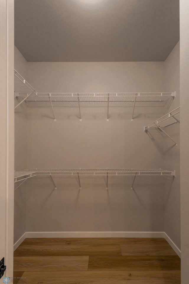 4174 Arthur Dr S, Fargo, ND 58104 - spacious closet featuring wood finished floors