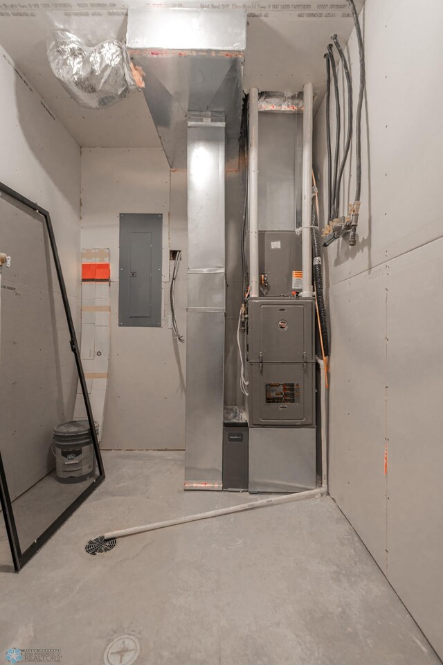 4174 Arthur Dr S, Fargo, ND 58104 - utility room featuring electric panel and heating unit