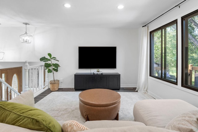9645 Garrison Way, Eden Prairie, MN 55347 - living room with recessed lighting, a chandelier, and wood finished floors