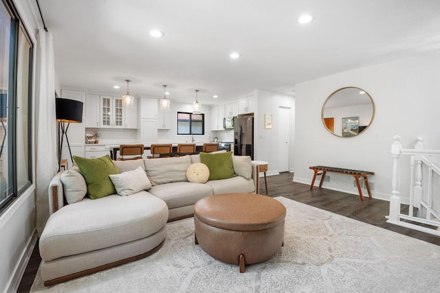 9645 Garrison Way, Eden Prairie, MN 55347 - living room with dark wood-style flooring, recessed lighting, and baseboards