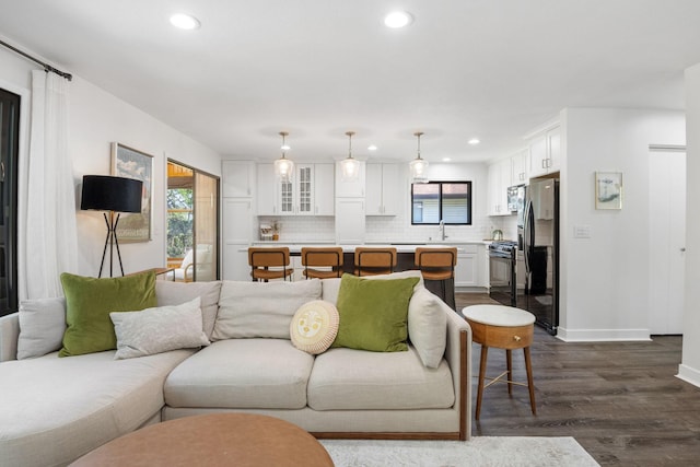 9645 Garrison Way, Eden Prairie, MN 55347 - living room featuring dark wood-type flooring, plenty of natural light, recessed lighting, and baseboards