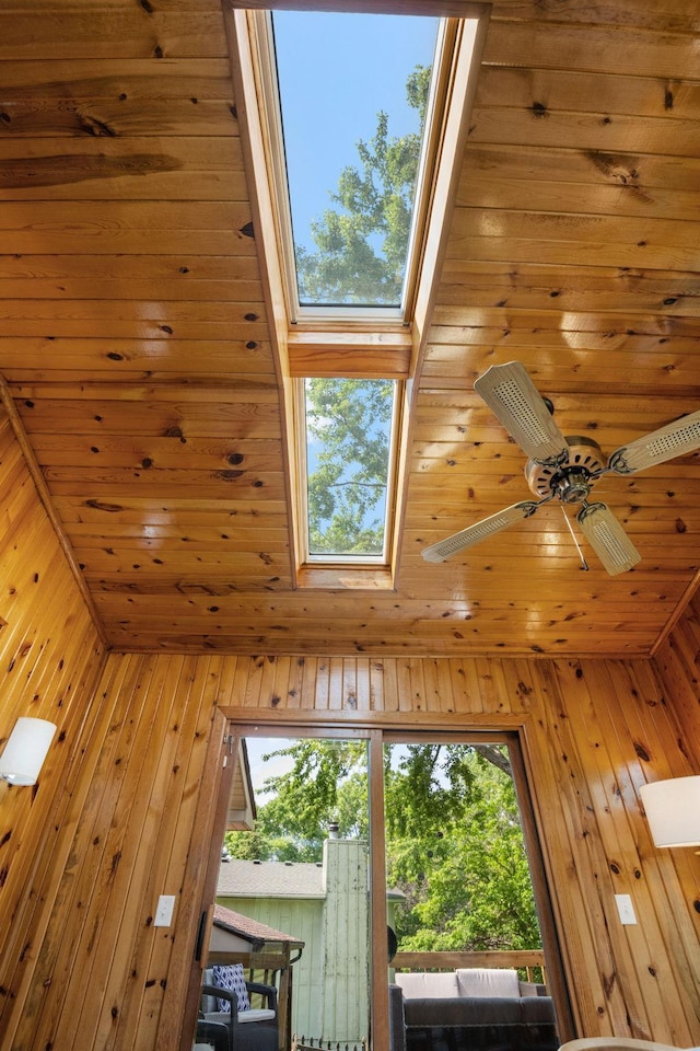 9645 Garrison Way, Eden Prairie, MN 55347 - detailed view of a skylight, wooden walls, and a ceiling fan