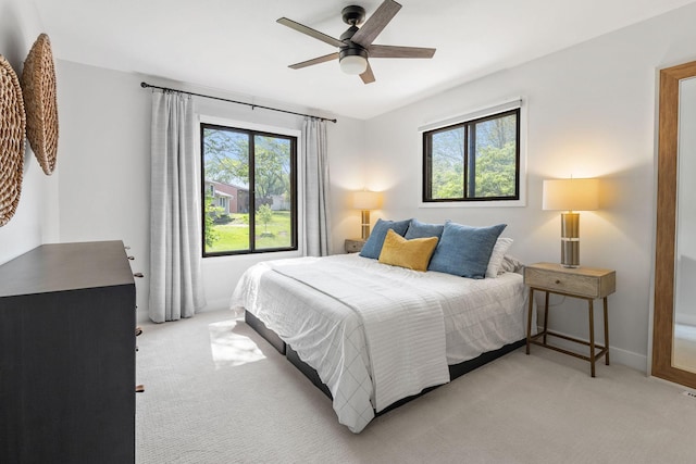 9645 Garrison Way, Eden Prairie, MN 55347 - bedroom featuring light colored carpet and ceiling fan