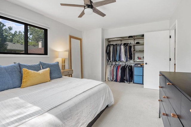9645 Garrison Way, Eden Prairie, MN 55347 - bedroom featuring light colored carpet, a closet, and ceiling fan
