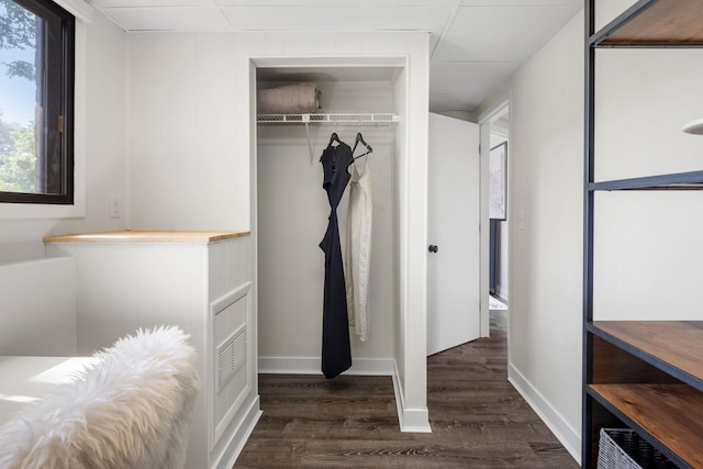 9645 Garrison Way, Eden Prairie, MN 55347 - unfurnished bedroom with wood finished floors, a closet, and baseboards