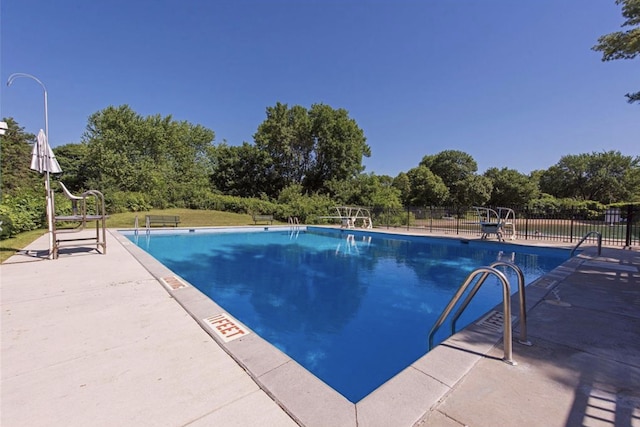 9645 Garrison Way, Eden Prairie, MN 55347 - community pool featuring a patio and view of scattered trees