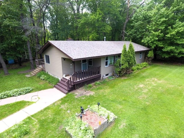 7780 Fawn Lake Dr NE, Stacy, MN 55079 - single story home featuring roof with shingles and a front lawn