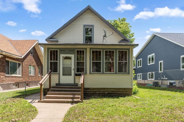 1404 Russell Ave N, Minneapolis, MN 55411 - view of front facade featuring entry steps and central AC