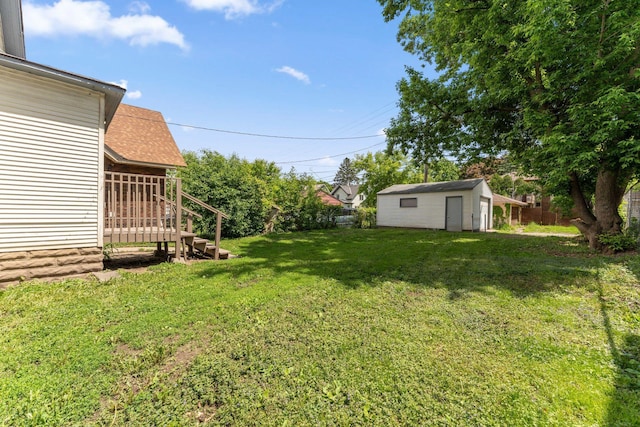 1404 Russell Ave N, Minneapolis, MN 55411 - view of green lawn featuring an outbuilding and stairs