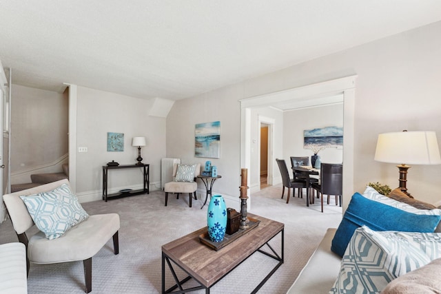 1404 Russell Ave N, Minneapolis, MN 55411 - living area with light carpet, radiator heating unit, and baseboards