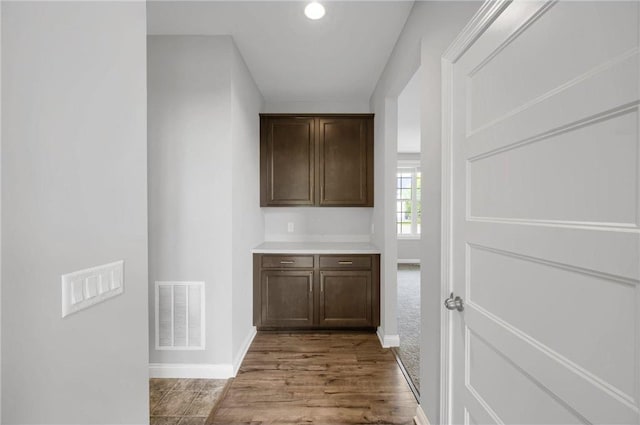6919 156th St, Savage, MN 55378 - bar area featuring wood finished floors and recessed lighting