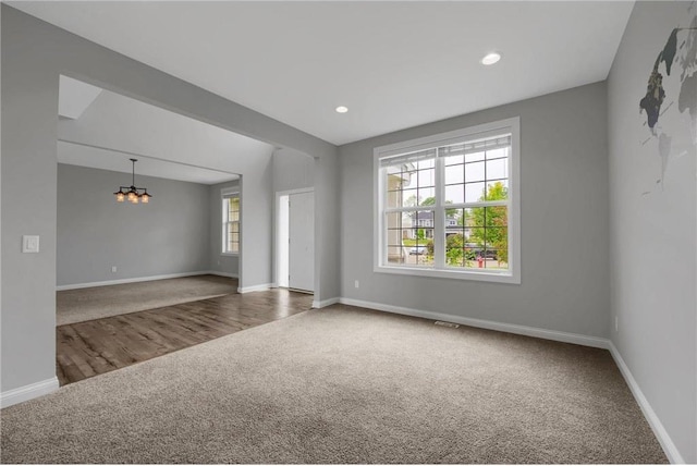 6919 156th St, Savage, MN 55378 - carpeted empty room featuring a chandelier and recessed lighting