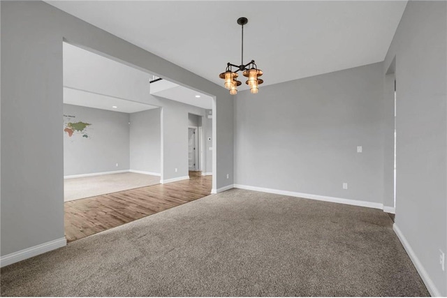 6919 156th St, Savage, MN 55378 - empty room with carpet floors and a chandelier