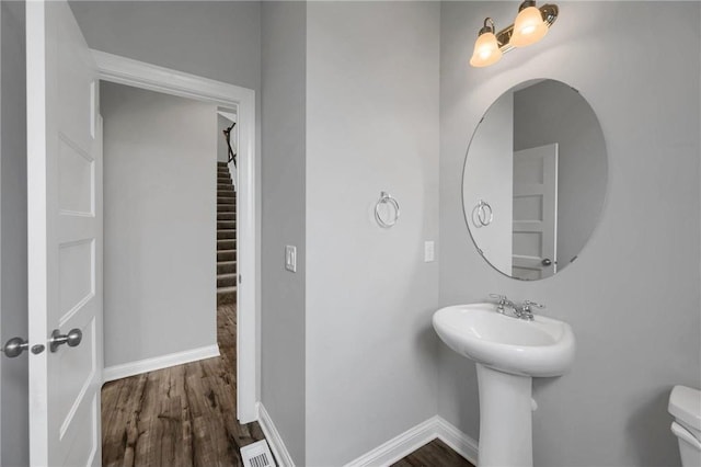 6919 156th St, Savage, MN 55378 - bathroom with wood finished floors and a sink