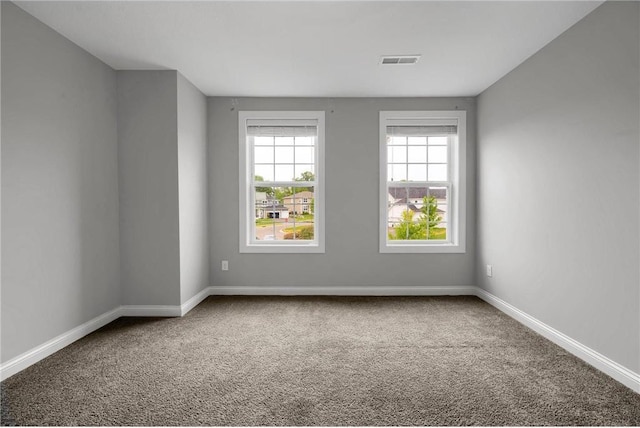 6919 156th St, Savage, MN 55378 - carpeted empty room featuring baseboards