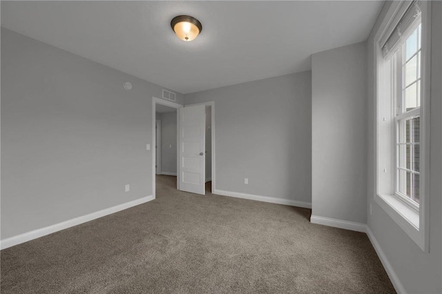 6919 156th St, Savage, MN 55378 - spare room with carpet flooring and healthy amount of natural light
