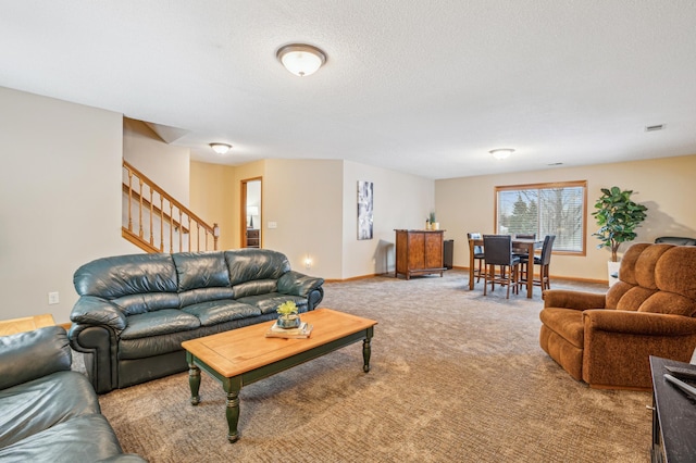 8634 Corbin Ct, Inver Grove Heights, MN 55076 - living area featuring carpet floors, stairs, baseboards, and a textured ceiling