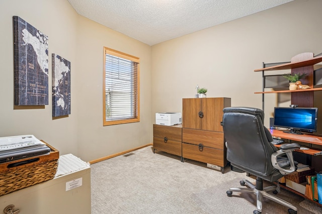 8634 Corbin Ct, Inver Grove Heights, MN 55076 - office area featuring light colored carpet, a textured ceiling, and baseboards