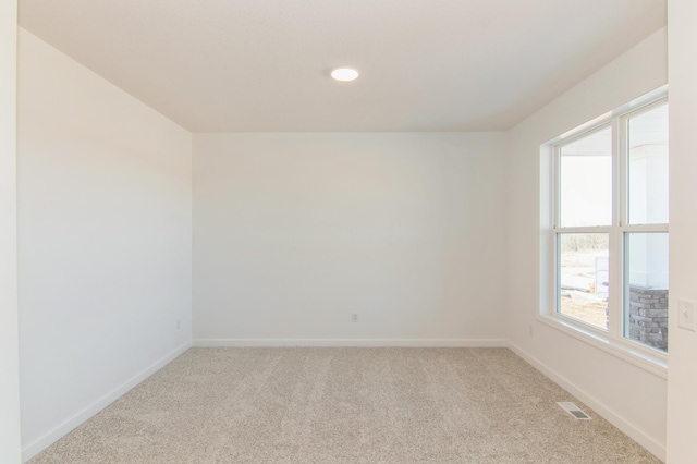 914 Milborne Ln NW, Rochester, MN 55901 - empty room featuring carpet flooring, baseboards, and recessed lighting