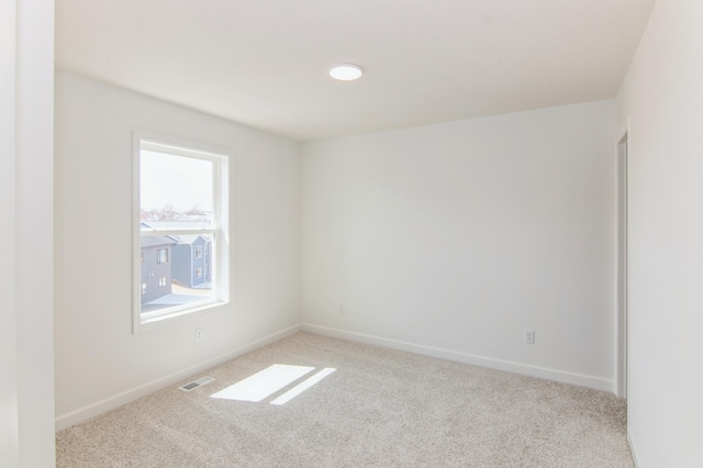 914 Milborne Ln NW, Rochester, MN 55901 - carpeted empty room with baseboards