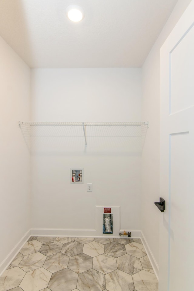 914 Milborne Ln NW, Rochester, MN 55901 - washroom with light marble finish flooring, baseboards, and washer hookup