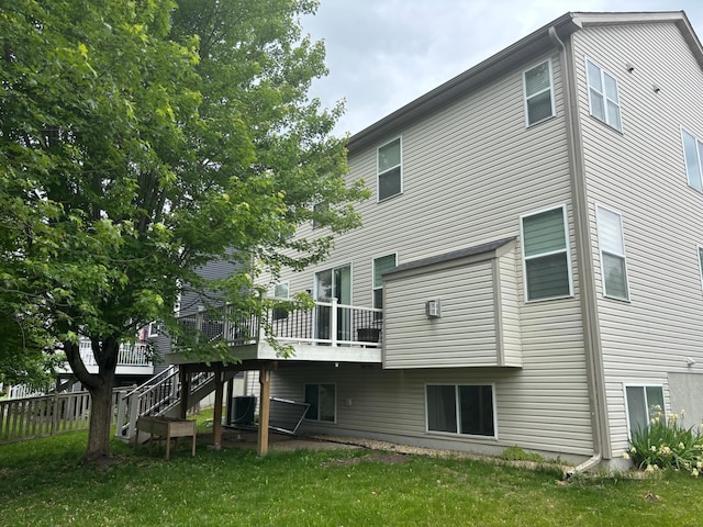 17089 76th Pl N, Maple Grove, MN 55311 - rear view of property with a wooden deck, stairs, and central air condition unit