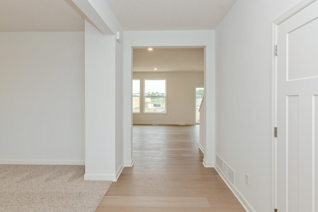 5051 52nd Ave NW, Rochester, MN 55901 - corridor featuring light wood-type flooring, recessed lighting, and baseboards