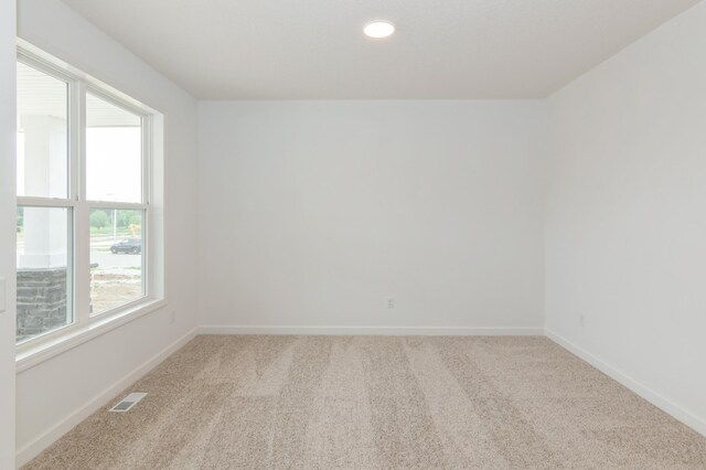 5051 52nd Ave NW, Rochester, MN 55901 - spare room with carpet floors, baseboards, and recessed lighting
