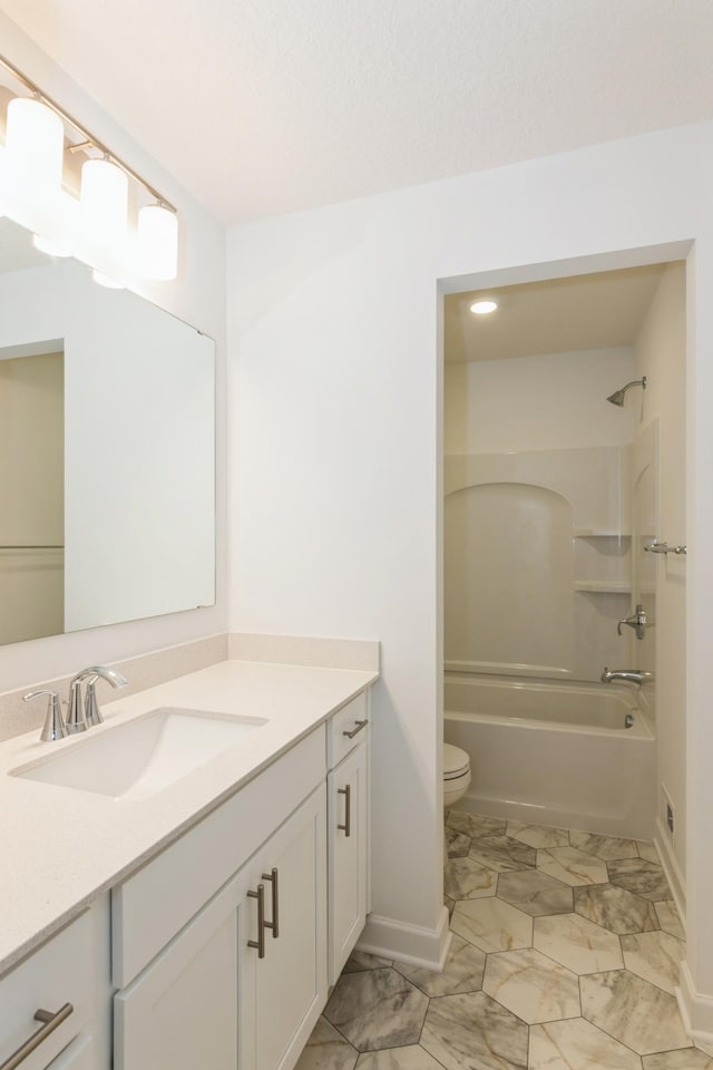 5051 52nd Ave NW, Rochester, MN 55901 - full bath featuring vanity, baseboards, marble look tile flooring, and shower / bath combination