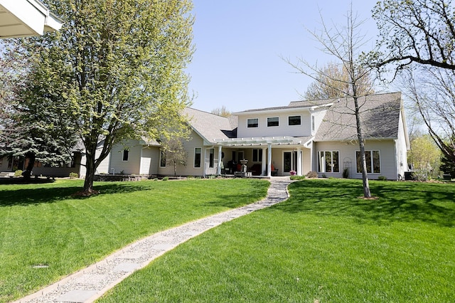 1120 Southridge Rd, New Ulm, MN 56073 - rear view of house with a pergola, a lawn, a patio, and a shingled roof