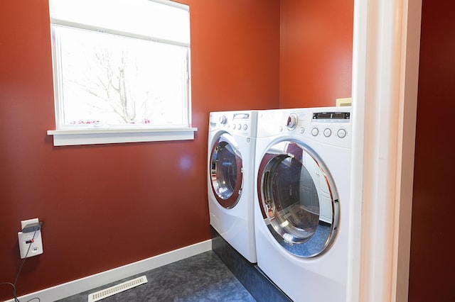 1120 Southridge Rd, New Ulm, MN 56073 - washroom with washer and dryer and baseboards