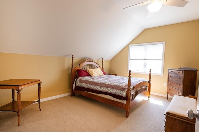 1120 Southridge Rd, New Ulm, MN 56073 - bedroom featuring light carpet, vaulted ceiling, a ceiling fan, and baseboards