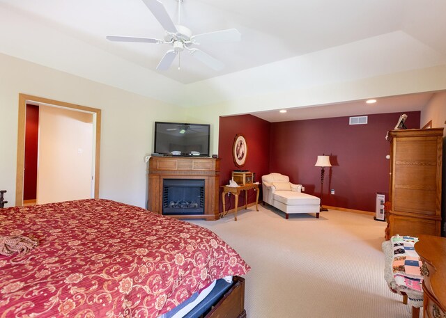 1120 Southridge Rd, New Ulm, MN 56073 - carpeted bedroom with a fireplace and ceiling fan
