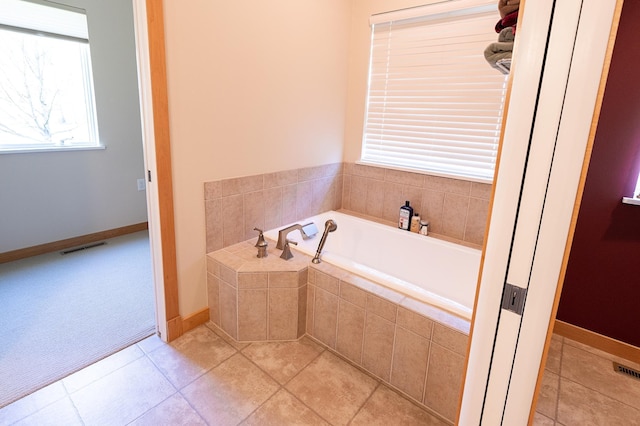 1120 Southridge Rd, New Ulm, MN 56073 - bathroom with a bath, tile patterned floors, and baseboards