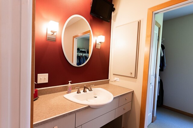 1120 Southridge Rd, New Ulm, MN 56073 - bathroom with vanity and a spacious closet