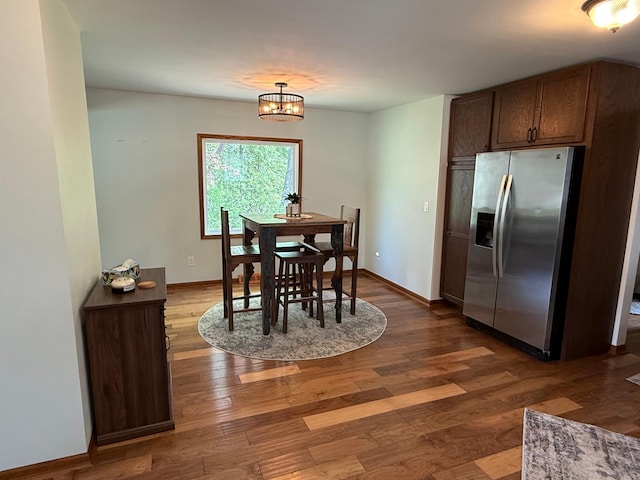 11966 Lindquist Rd, Hibbing, MN 55746 - dining space featuring dark wood-style flooring and baseboards