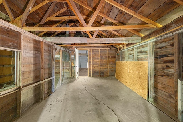 517 1st Ave NW, Winnebago, MN 56098 - misc room featuring vaulted ceiling and unfinished concrete floors