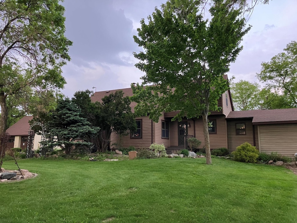 25988 185th Ave, Ripley Twp, MN 56449 - view of front facade with a front lawn and roof with shingles