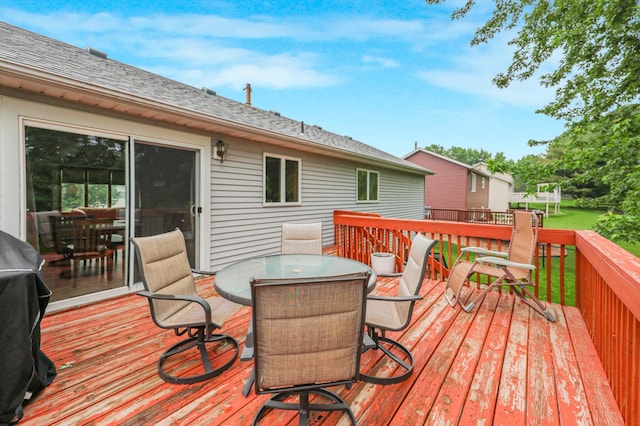 810 7th Ave N, Sauk Rapids, MN 56379 - wooden deck featuring outdoor dining area