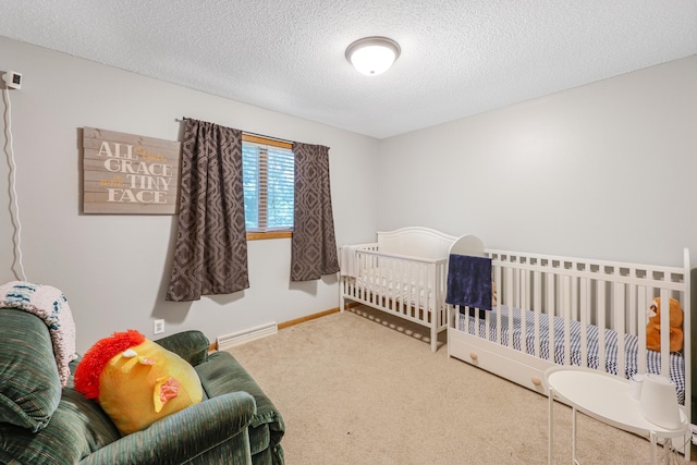 810 7th Ave N, Sauk Rapids, MN 56379 - bedroom featuring carpet, a textured ceiling, and baseboards