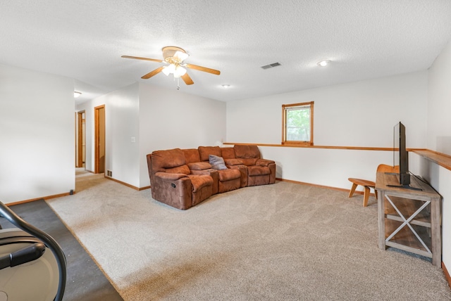 810 7th Ave N, Sauk Rapids, MN 56379 - carpeted living room with ceiling fan, a textured ceiling, and baseboards