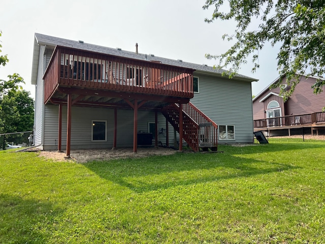 810 7th Ave N, Sauk Rapids, MN 56379 - back of house with a wooden deck, a lawn, stairs, and central AC