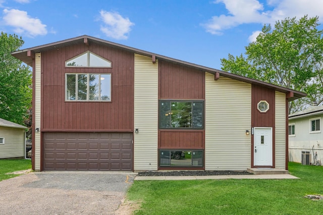 6535 Dawn Way, Inver Grove Heights, MN 55076 - view of front facade with driveway, a front lawn, and a garage